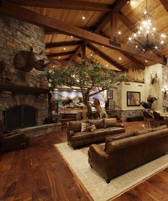 Lodge trophy room with rhino, lion and Cape buffalo mounts